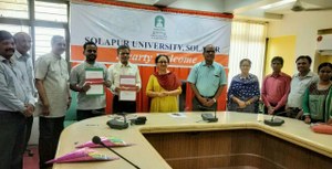MoU between PAH Solapur University & CIS-A2K